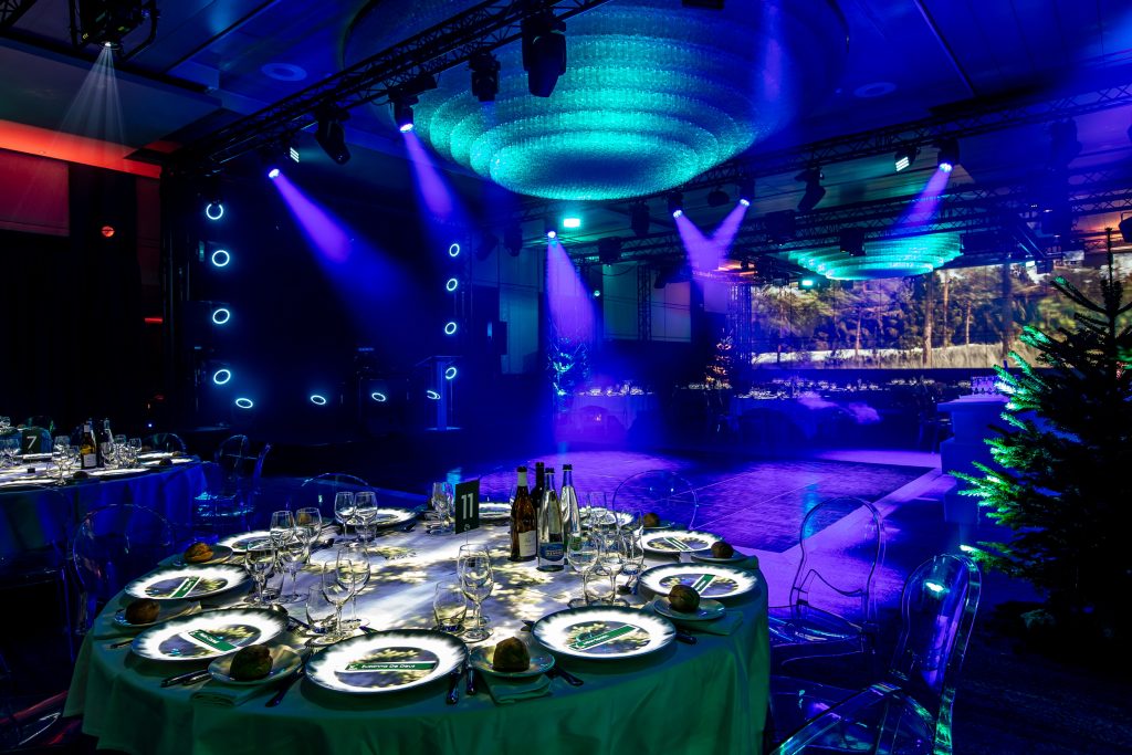 Modular event room at Crowne Plaza Geneva transformed for a private event with stage lighting.